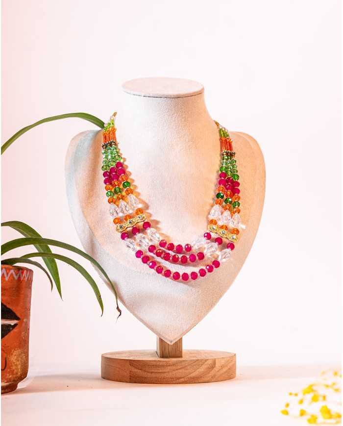 COLLAR Y ARETES WAMINSI FUCSIA CRISTALES