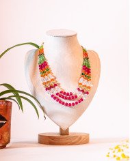 COLLAR Y ARETES WAMINSI FUCSIA CRISTALES