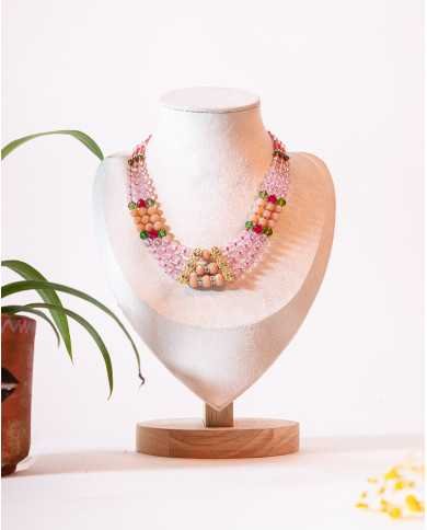 COLLAR Y ARETES TULLPUY ROSA CRISTALES