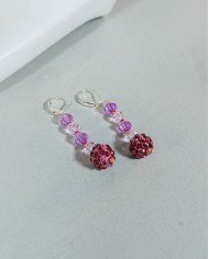 COLLAR Y ARETES KAWSARINA ROSA CRISTALES